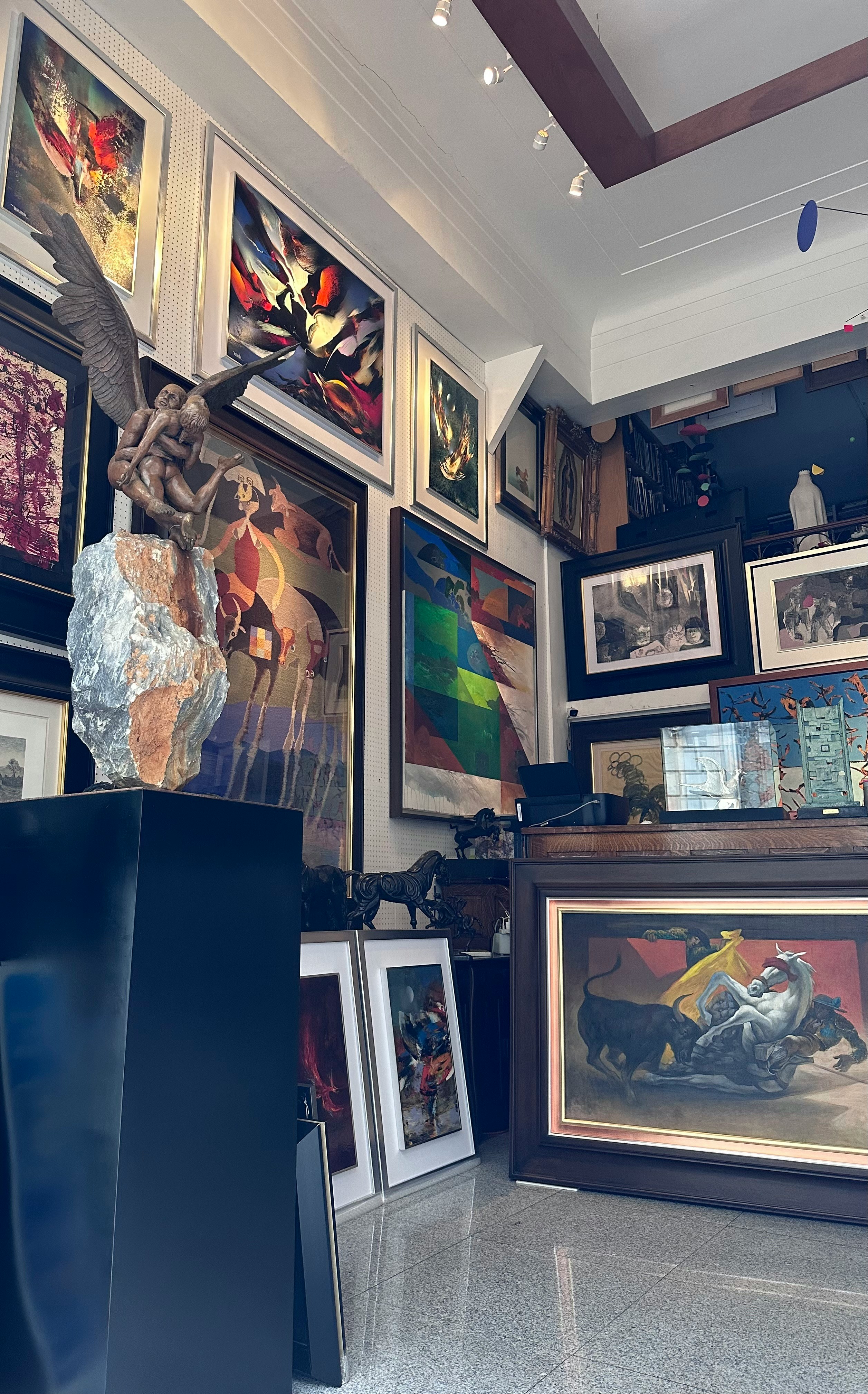 A collector's space filled with paintings and sculpture