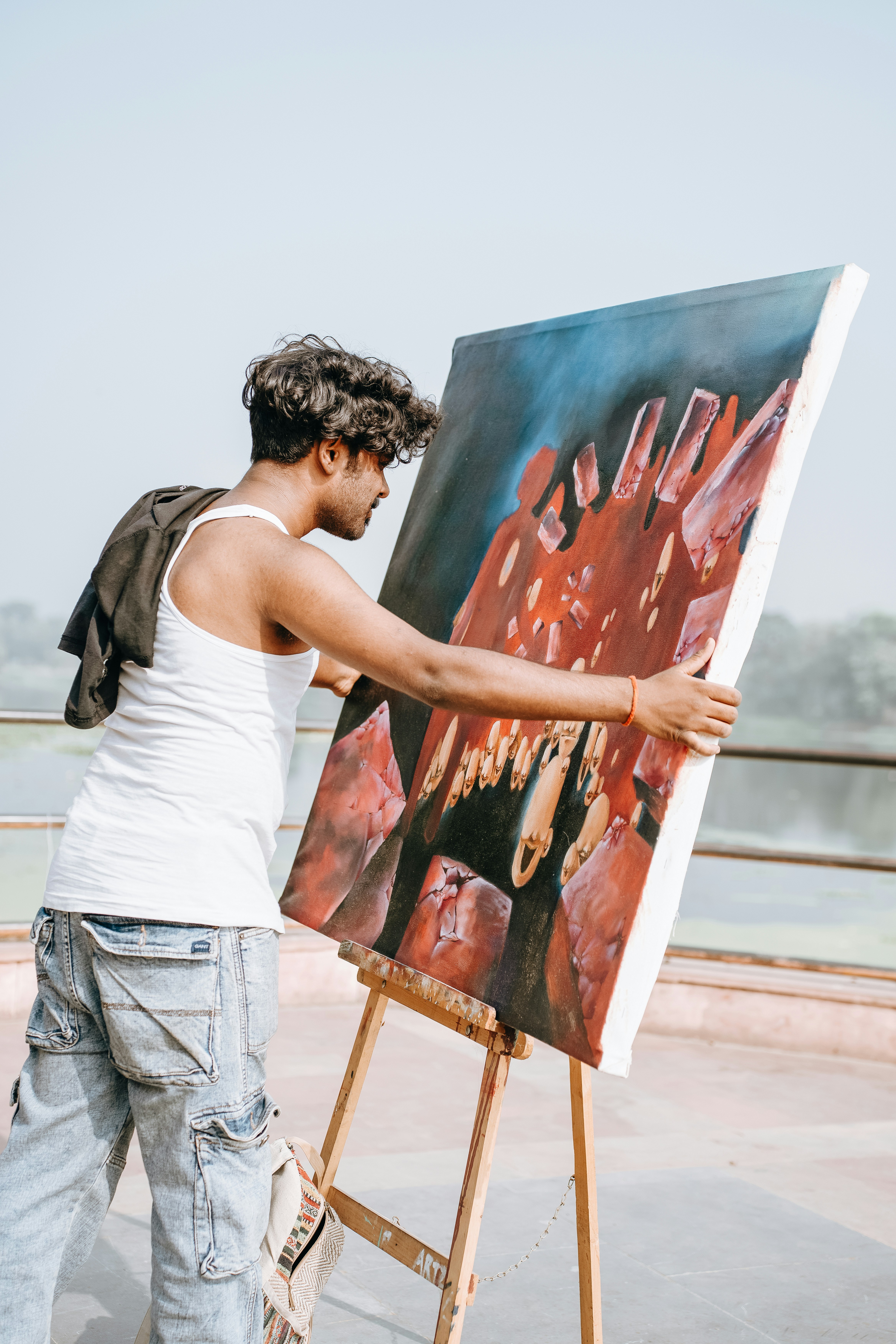Artist with painting